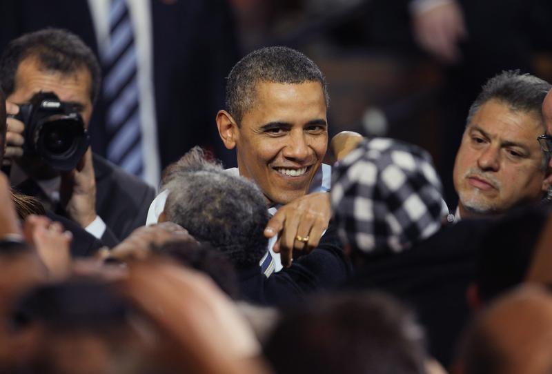 President Barack Obama greets workers following a speech at the Master Lock factory on February 15, 2012 in Milwaukee, Wisconsin.